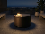 A round outdoor gas fire pit table